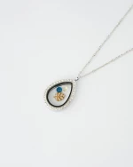 Silver Teardrop Memory Locket Necklace with Blue Gemstones and Gold Leaf